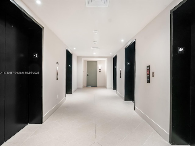 corridor featuring elevator