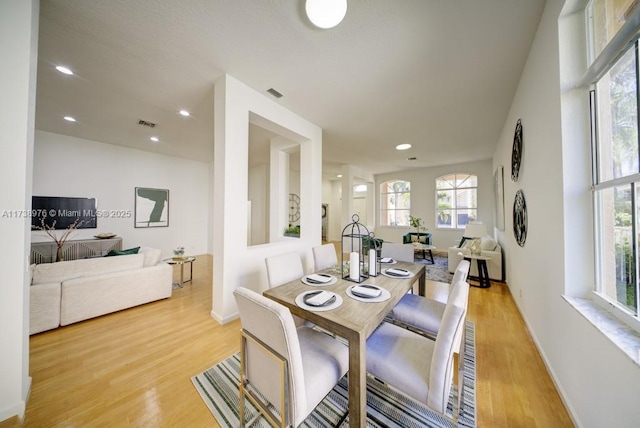 dining room with light wood-type flooring