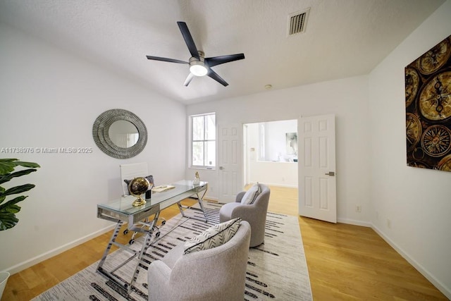 office area featuring ceiling fan and light wood-type flooring