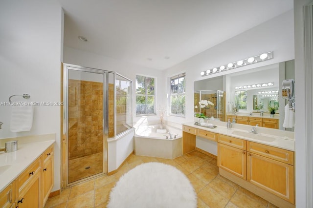 bathroom featuring vanity, separate shower and tub, and tile patterned floors