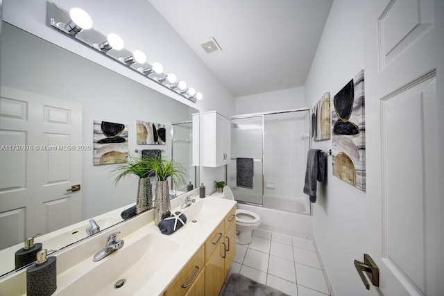 full bathroom with tile patterned floors, toilet, combined bath / shower with glass door, and vanity