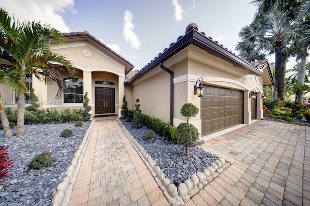 view of front of property featuring a garage