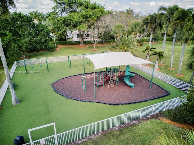 view of jungle gym with a lawn