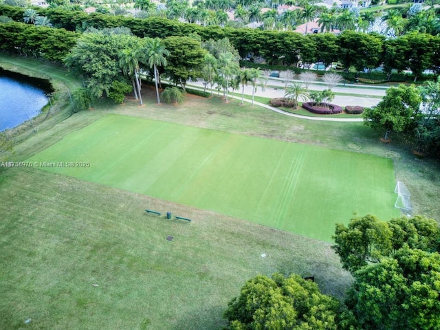 surrounding community featuring a water view