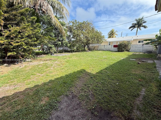 view of yard featuring fence