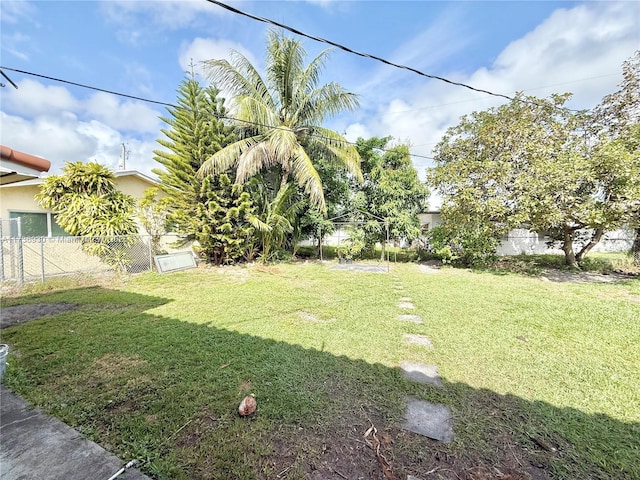 view of yard with fence