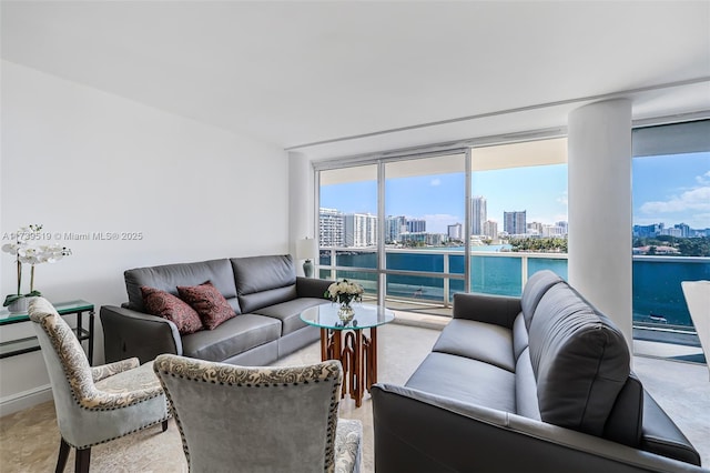 living room featuring a water view