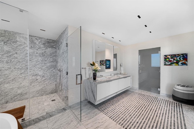 bathroom with vanity and an enclosed shower