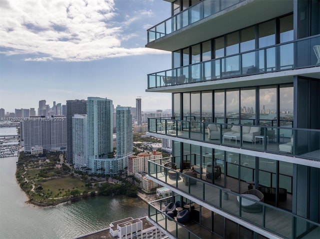 property's view of city featuring a water view