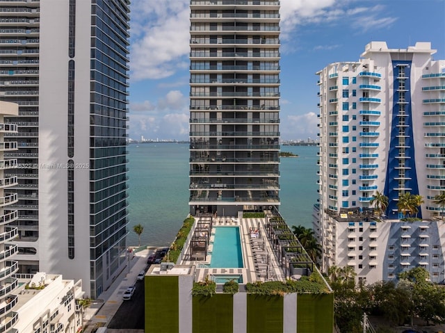 view of building exterior with a water view