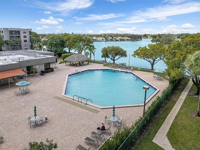 view of swimming pool with a gazebo, a water view, and a patio