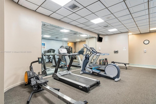 workout area with a drop ceiling