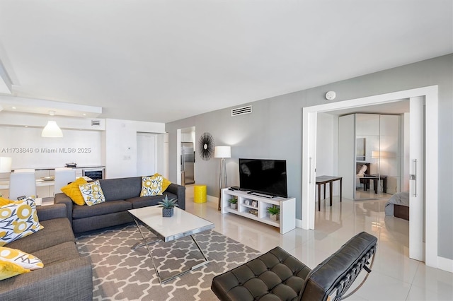 living room featuring tile patterned flooring