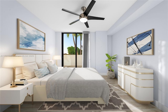 bedroom featuring floor to ceiling windows, ceiling fan, and light wood-type flooring