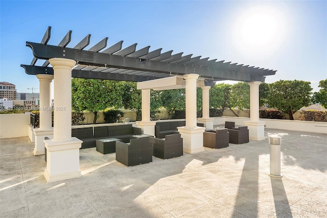 view of patio / terrace featuring an outdoor living space and a pergola