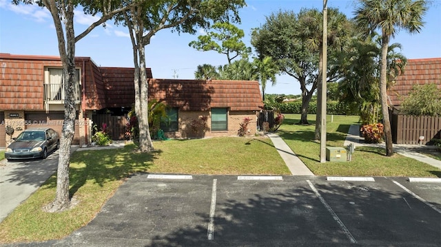 exterior space featuring a front yard