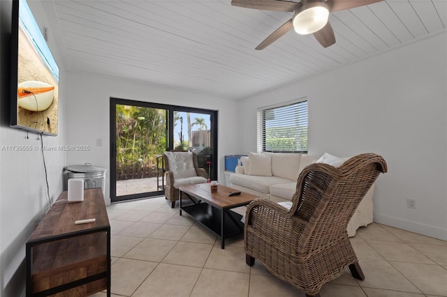 tiled living room featuring wood ceiling and ceiling fan