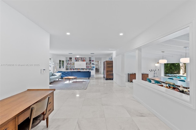 hallway with light tile patterned floors