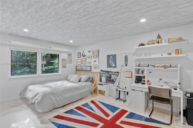 bedroom with a textured ceiling