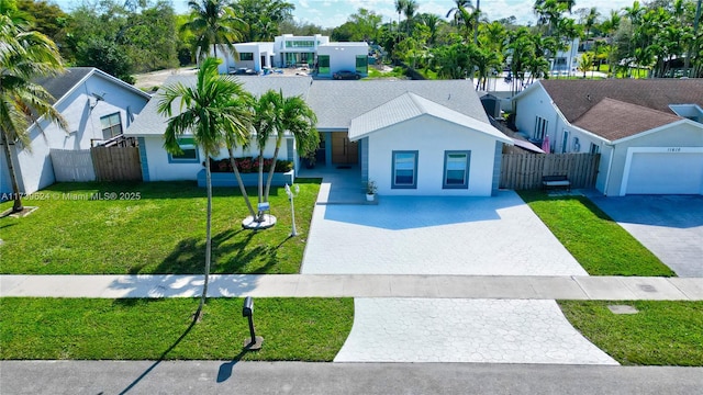 view of front facade with a front yard