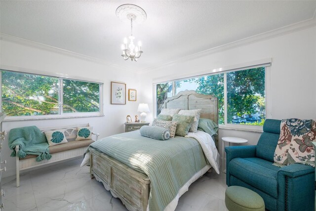 bedroom with an inviting chandelier and ornamental molding