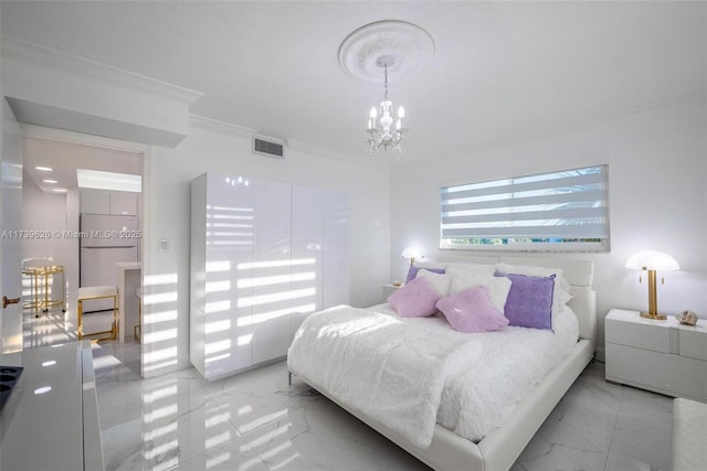 bedroom featuring ornamental molding and a notable chandelier