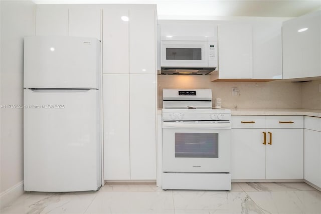 kitchen with white cabinetry, white appliances, and decorative backsplash