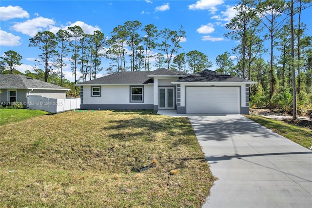 ranch-style house with a garage and a front yard