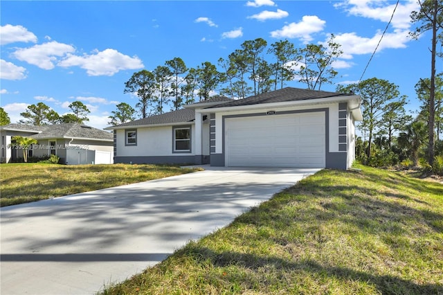 single story home with a garage and a front yard