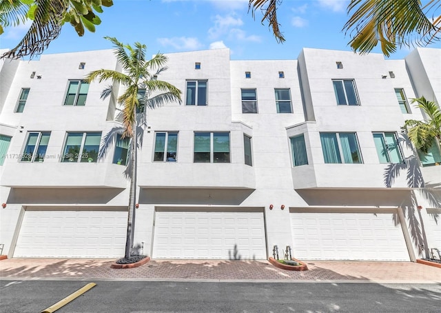 2138 Van Buren St Unit 606, Hollywood, FL 33020 - view of property with a garage and driveway