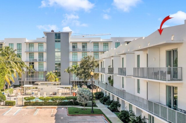 2138 Van Buren St Unit 606, Hollywood, FL 33020 - view of building exterior featuring uncovered parking