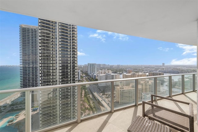 balcony featuring a water view