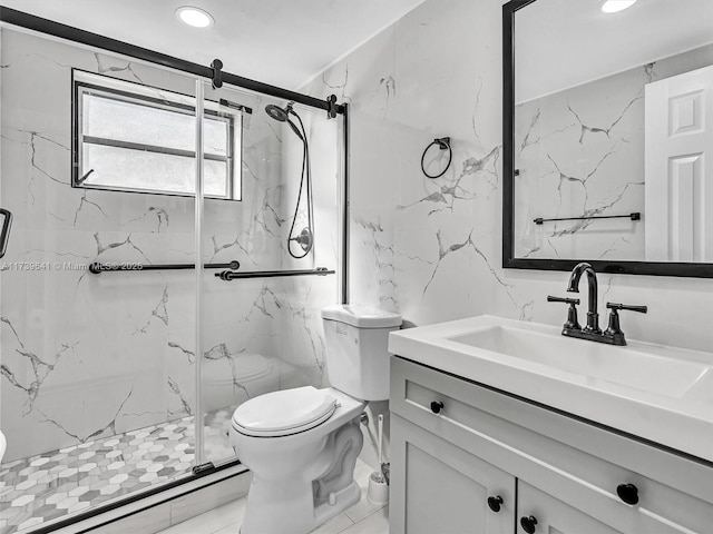 full bathroom featuring toilet, a baseboard heating unit, vanity, tile walls, and a marble finish shower