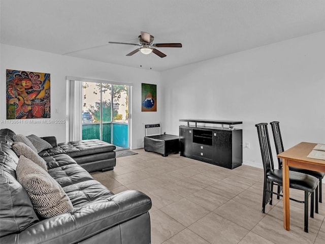 16900 NE 14th Ave Unit 115, Miami, FL 33162 - living area with a ceiling fan and light tile patterned floors