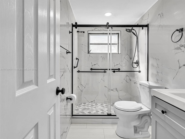 full bathroom featuring marble finish floor, toilet, vanity, and a marble finish shower