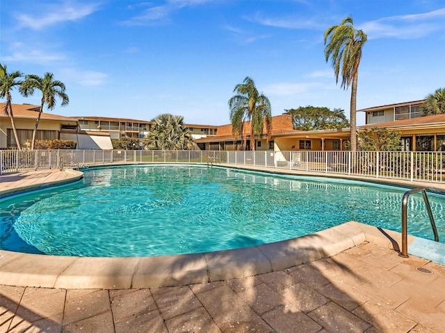 pool featuring fence