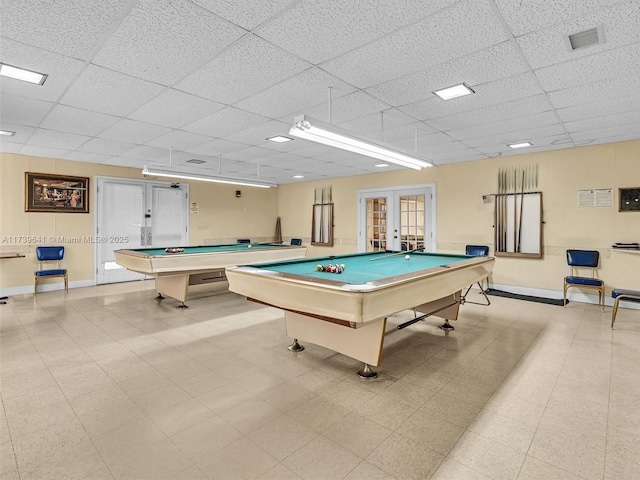 playroom featuring french doors, billiards, a paneled ceiling, and baseboards