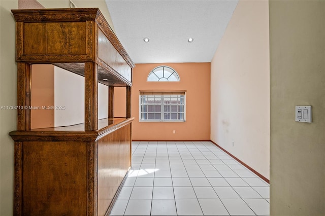 empty room with light tile patterned flooring