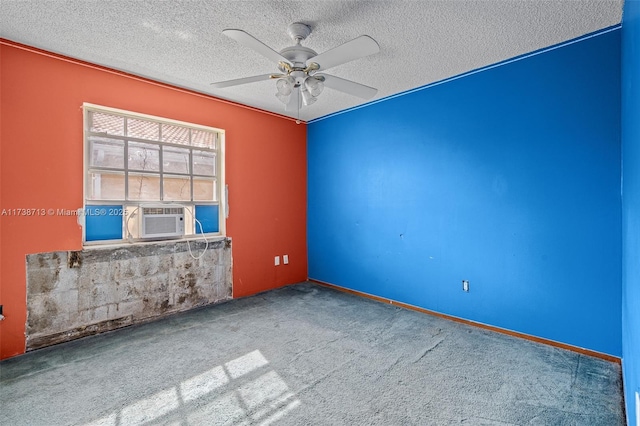 unfurnished room featuring cooling unit, ceiling fan, carpet, and a textured ceiling