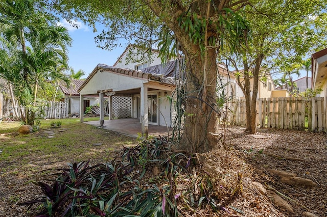 rear view of property with a patio