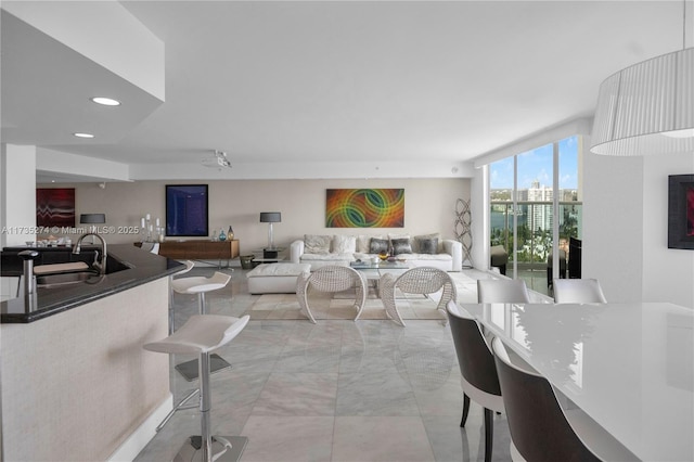 dining area featuring recessed lighting