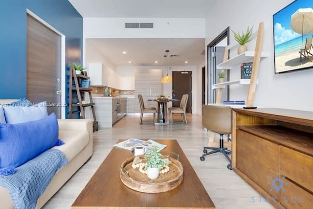 living room featuring light hardwood / wood-style floors