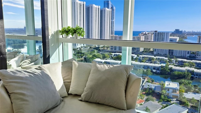 balcony featuring a water view