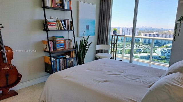 bedroom featuring multiple windows