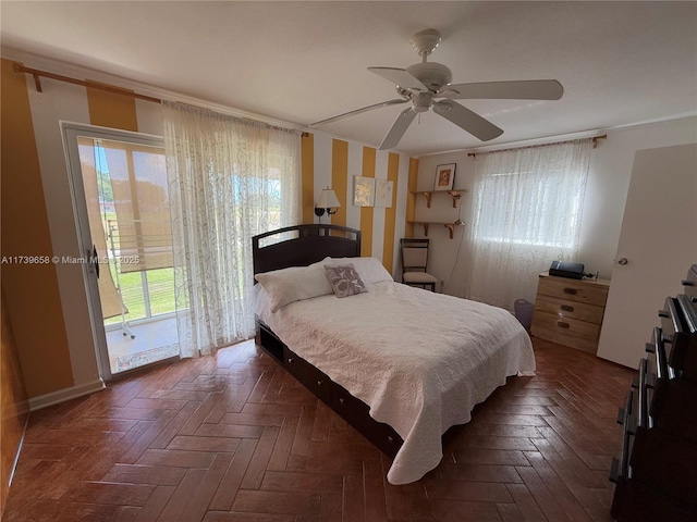 bedroom featuring access to exterior, dark parquet flooring, and ceiling fan