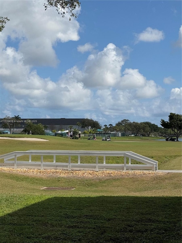 view of community featuring a yard