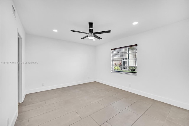 spare room featuring ceiling fan