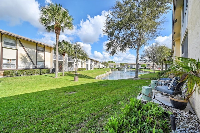 view of yard with a water view