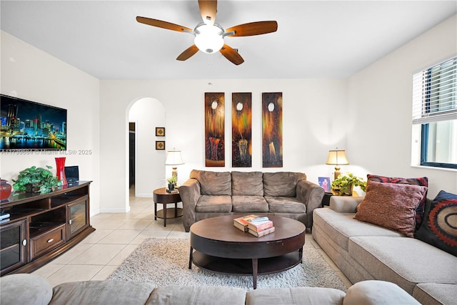 living room with light tile patterned flooring and ceiling fan