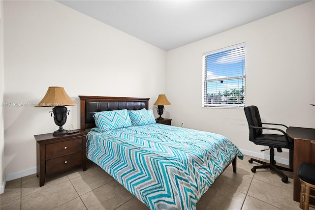 bedroom featuring light tile patterned floors